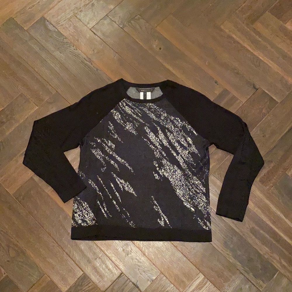 Soft, lightweight sweater. Dress up over black pants, dress down over jeans.